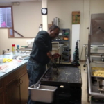 JW Myron Bell Sr. Frying Bacon For The Breakfast