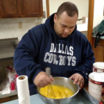 SD Myron Bell Jr scrambling eggs for the breakfast