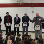 W.M Hal addressing the children at Betz School