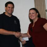 S.W. Kyle Beckner presenting check to Meredith Petit,Principal of Fort Crook Elementary