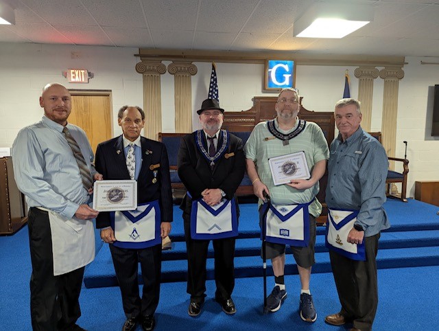 On March 2, 2022 members of Bellevue Lodge presented Br. John Fikkers and Br. Jesse H. Winn II with their Titanium Trowels and Certificates. Mentors are Br. Dan Alati and W.B. Bill Pickle.